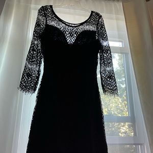 Beautiful black lace mini dress with lace edge